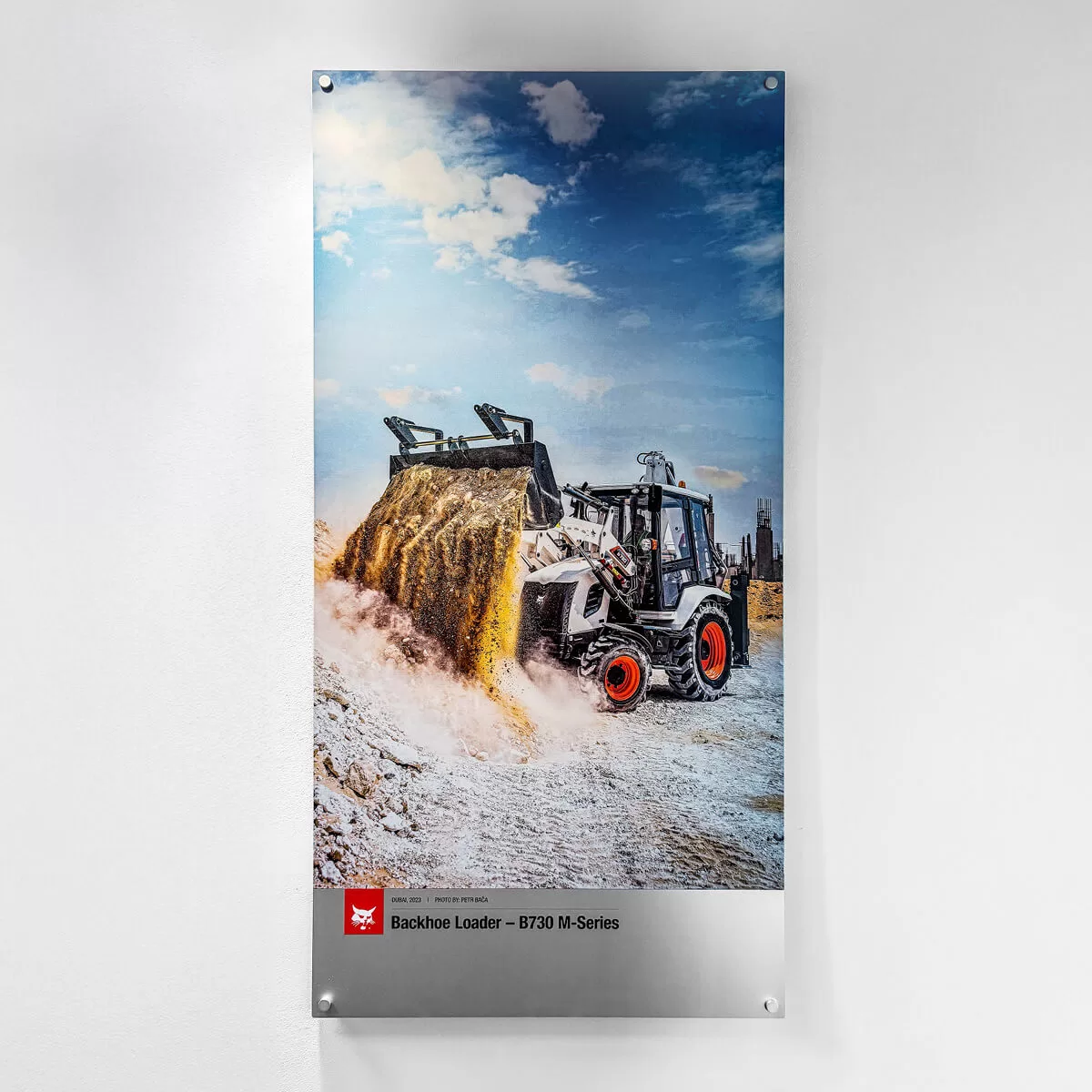 Aluminium poster – B730 backhoe loader working with sand